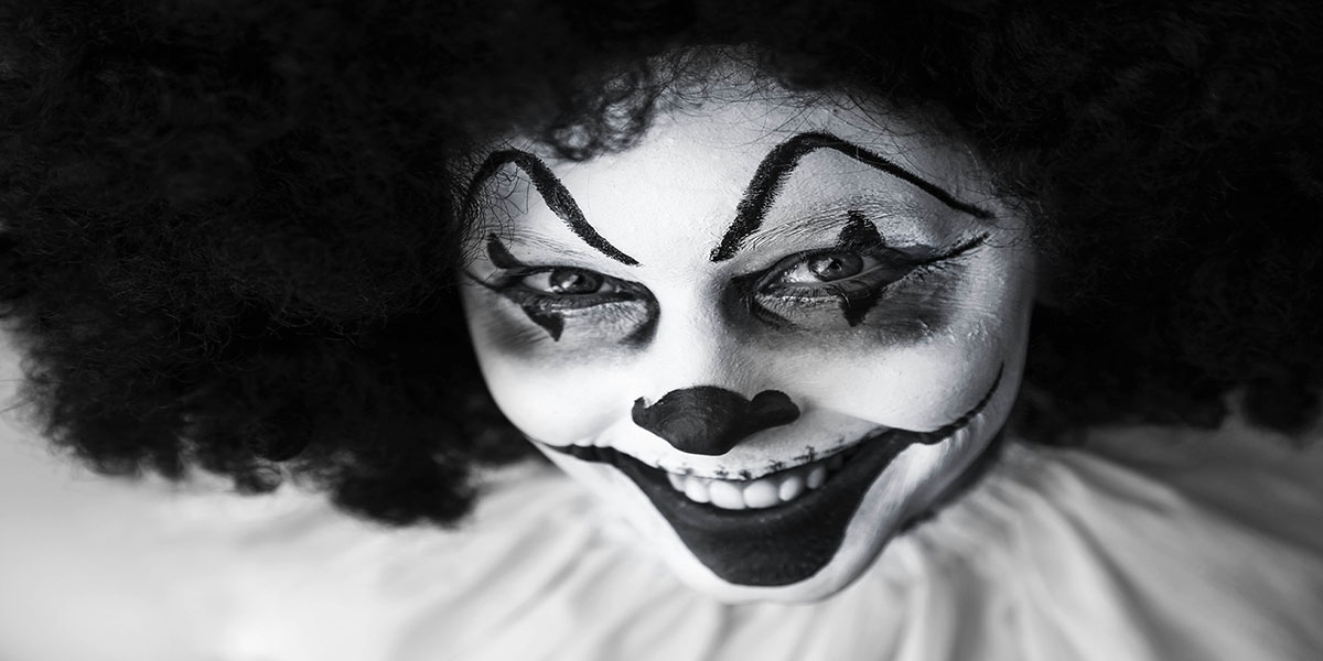 clown-creepy-grinning-facepaint-39242